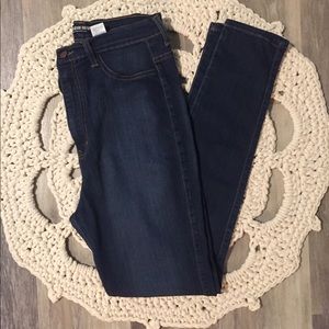 Medium wash high waisted jeans.